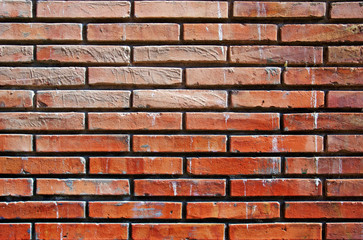 Abstract orange wall made of bricks. Good as background.