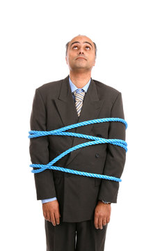 Businessman Tied Up By Rope