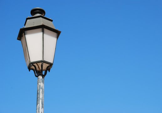 Vintage lamp post (blue sky background)