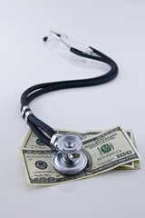 stethoscope and money
