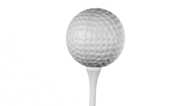 Golf ball on tee isolated against white - HD