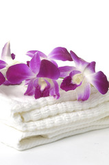 Naklejka na ściany i meble Beauty orchid and towel