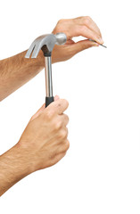 Claw hammer and hand with nail