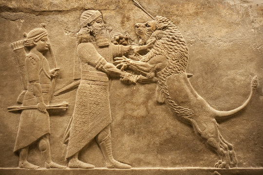 Assirian warrior hunting lions