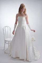 Fototapeta na wymiar Beautiful bride in white dress 3.