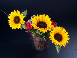 Obraz premium sunflowers bouquet on black