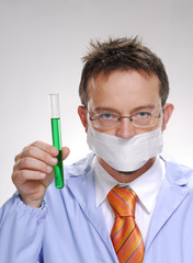 One young scientist holding an experimental tube.