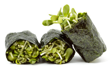 Sunflower sprouts wrapped in sushi nori - obrazy, fototapety, plakaty