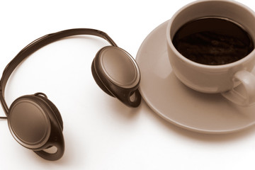 Obraz na płótnie Canvas Isolated cup ofr coffee with headphones, in sepia