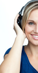 Fototapeta premium Woman listening to music with headphones on