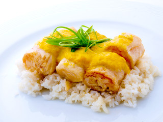Rolled Gourmet Fish with Rice in White Plate