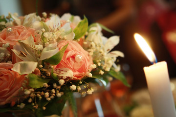 Wedding flowers and candle