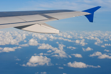 blue sky with aircraft wing