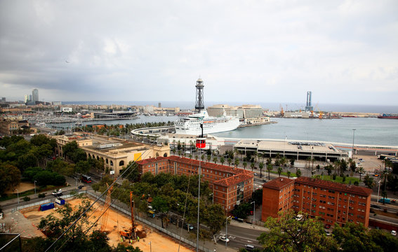 an aerial view of Barcelona City and harbor