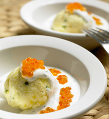 cold potato dumplings with cream and caviar