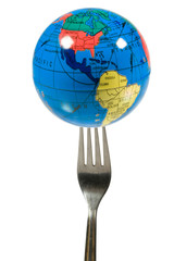 Small globe on a fork (isolated on white)