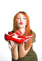 woman with the  red varnished shoes
