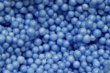 Small blue plastic balls background
