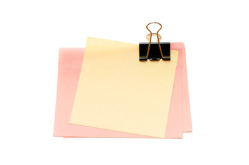 note paper and clip isolated on white