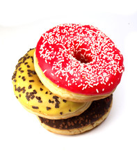 Delicious donuts on white background
