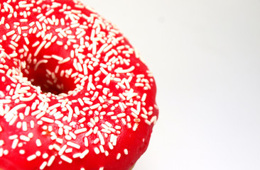 Red delicious donut on white background