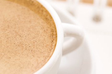 notebook and cup of coffee