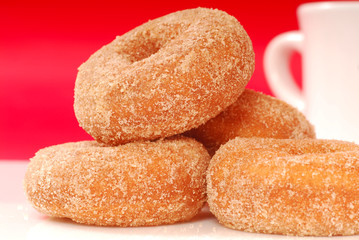 Apple cinnamon doughnuts with coffee