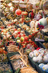 Painted christmas balls and tree decorations sold on the market