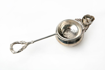 Tea strainer on a white background