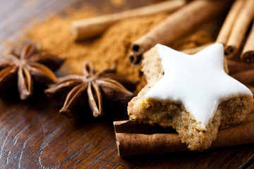 Close up of gingerberad cookie and spices