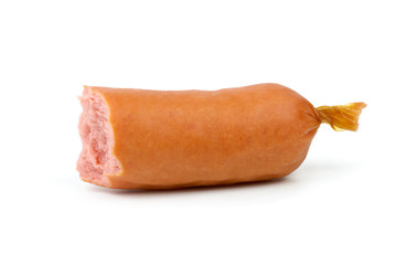 Half-eaten sausage isolated on the white background