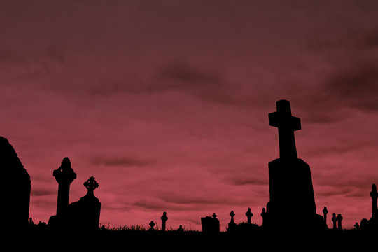 Crosses silhouettes against a cloudy sky