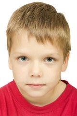Portrait of serious boy with expressive grey eyes