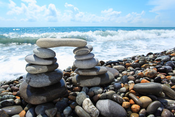arch from pebble on seacoast