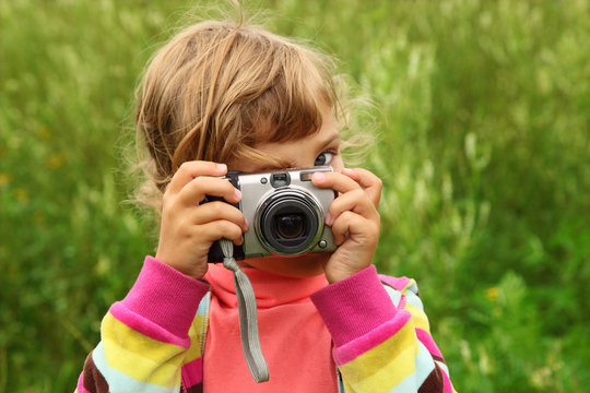 little girl  photographs outdoor