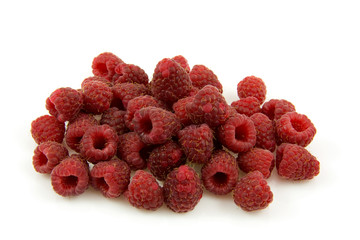pile of fresh raspberries over white background