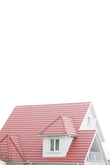 Vertical shot of red tile house roof isolated on white