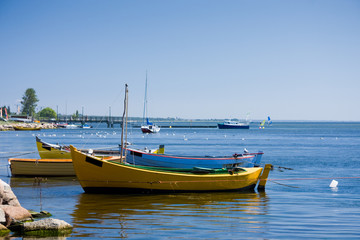 Naklejka na ściany i meble Fishing boats on a sea shore