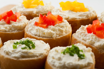 Mini sandwiches - bread with cream cheese and vegetables