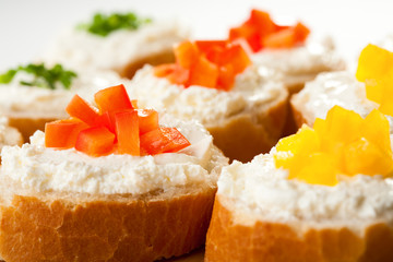 Mini sandwiches - bread with cream cheese and vegetables