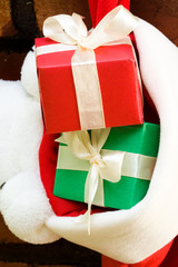 Gift boxes in a Christmas sock