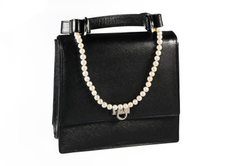 Evening woman bag with white pearl necklace