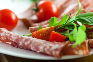 Cherry tomatoes,arugula and sliced salami