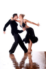 dancers in ballroom against white background