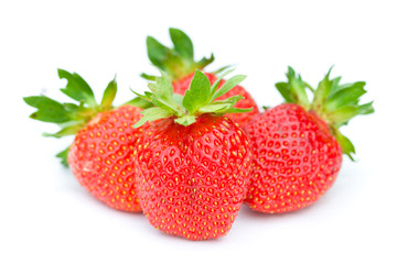 four ripe strawberries