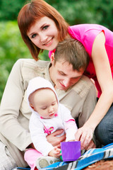 happy family on natural background