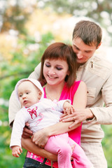 Fototapeta premium happy family on natural background