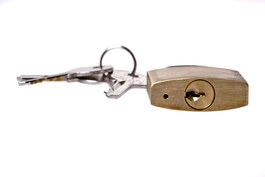 Brass pad lock on white background