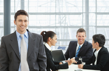 Happy businessman on meeting