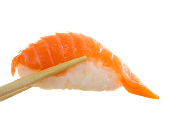 Sushi and chopsticks isolated on white